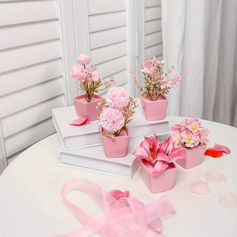 3-5 mini artificial potted pink flowers in plastic square pots, perfect for indoor décor on desks or bookshelves.