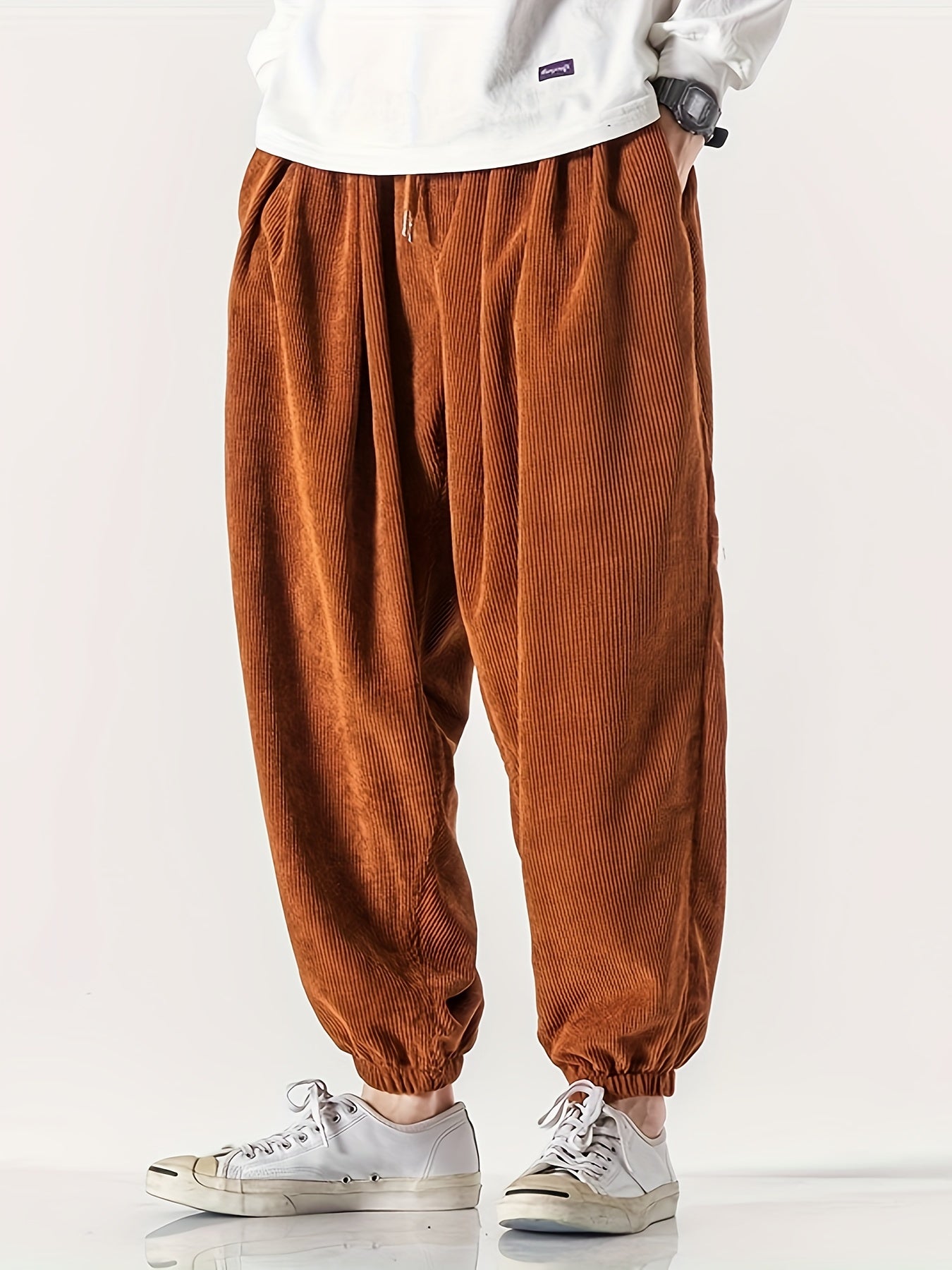 Men's wide leg corduroy pants with drawstring, chic and comfy for spring and fall.