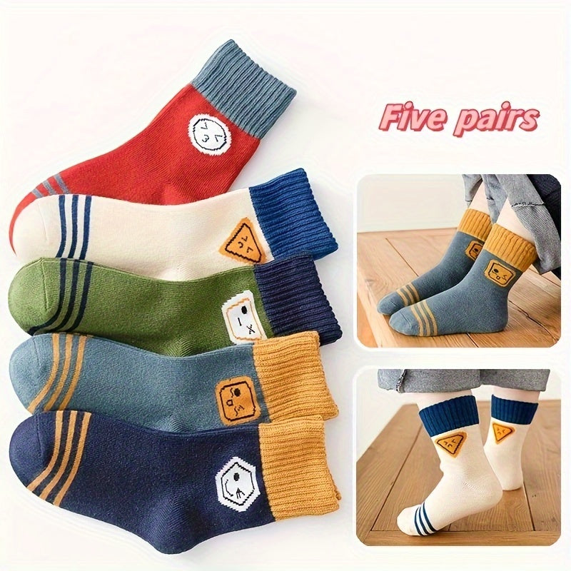 Child's 5-pair sock set with cartoon pattern. Made of polyester blend with spandex, hand washable, cozy, skin-friendly, in mid-calf height. Suitable for boys and girls in autumn/winter.