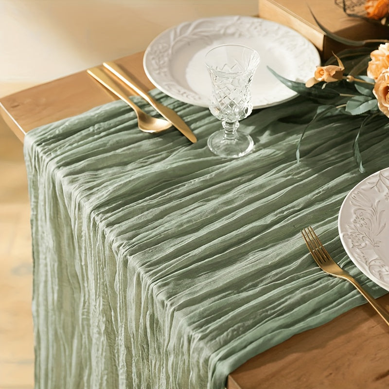 Boho table runner made of pleated polyester gauze, perfect for rustic or wedding decor. Ideal for holiday parties or showers.