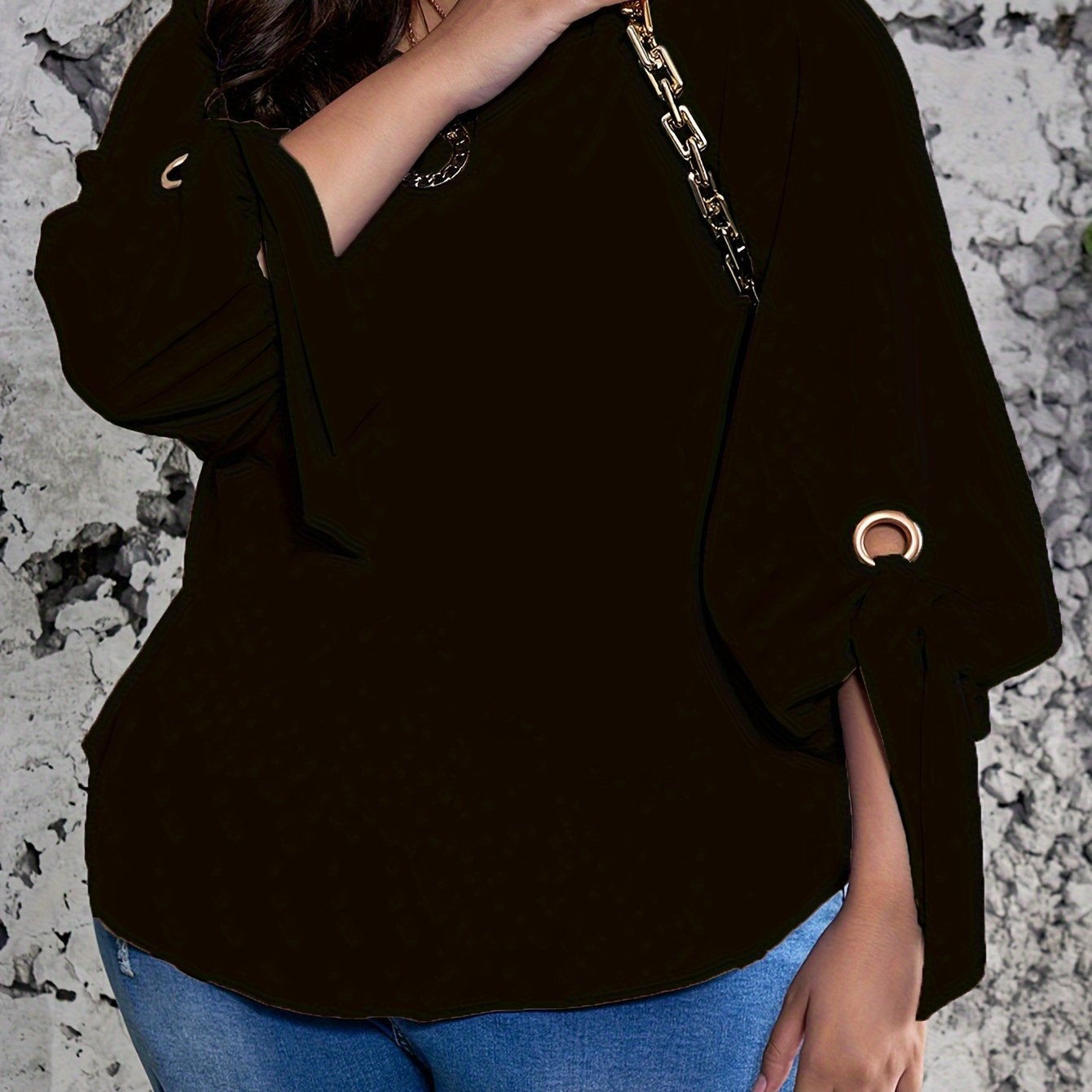 Plus size women's casual top with solid colors, lantern sleeves, round neck, round hem, and knot detail.