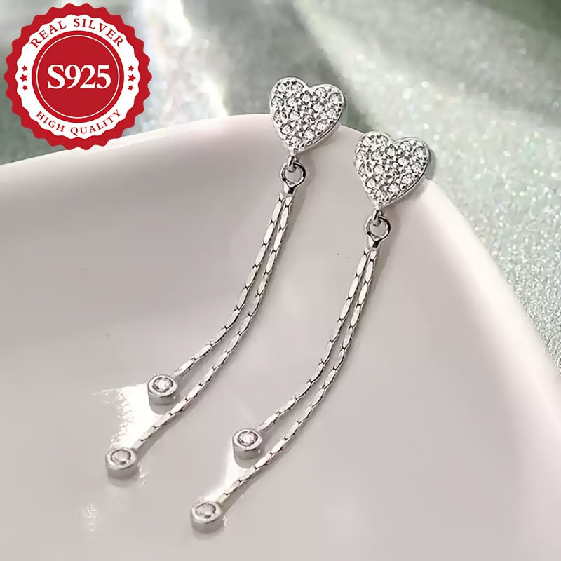 These earrings are made of high-quality S925 silver and feature a long tassel design that adds a super shiny touch. They are both elegant and stylish, with a delicate and cute look that is perfect for wearing at music festivals or for daily wear. They