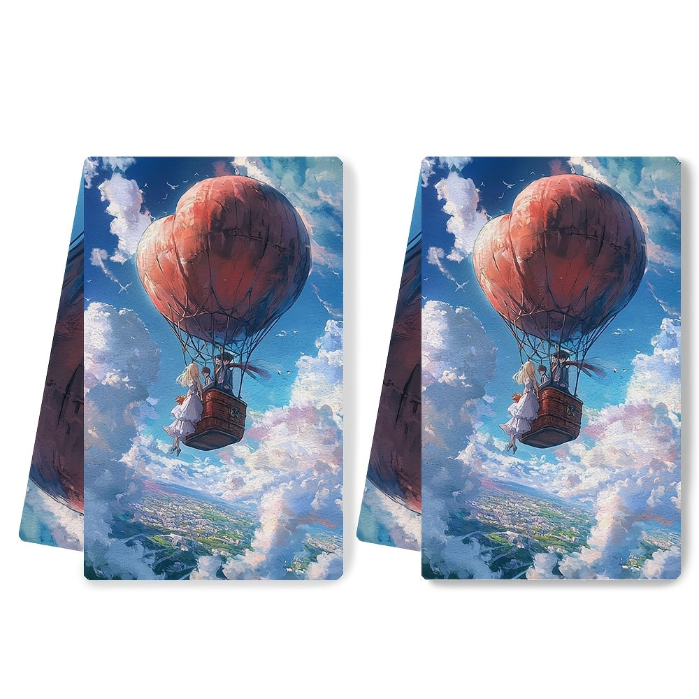 Pair of two super-soft kitchen towels showcasing an animated couple inside a heart-shaped hot air balloon. These highly absorbent dish towels are ideal for holiday decorating and can be easily cleaned in the washing machine. Each towel measures