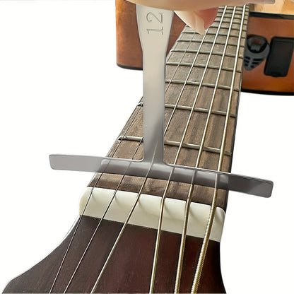 Set of 9 guitar fingerboard radius measuring rulers for guitar, bass, and ukulele repair and adjustment. Rulers include various radius sizes.