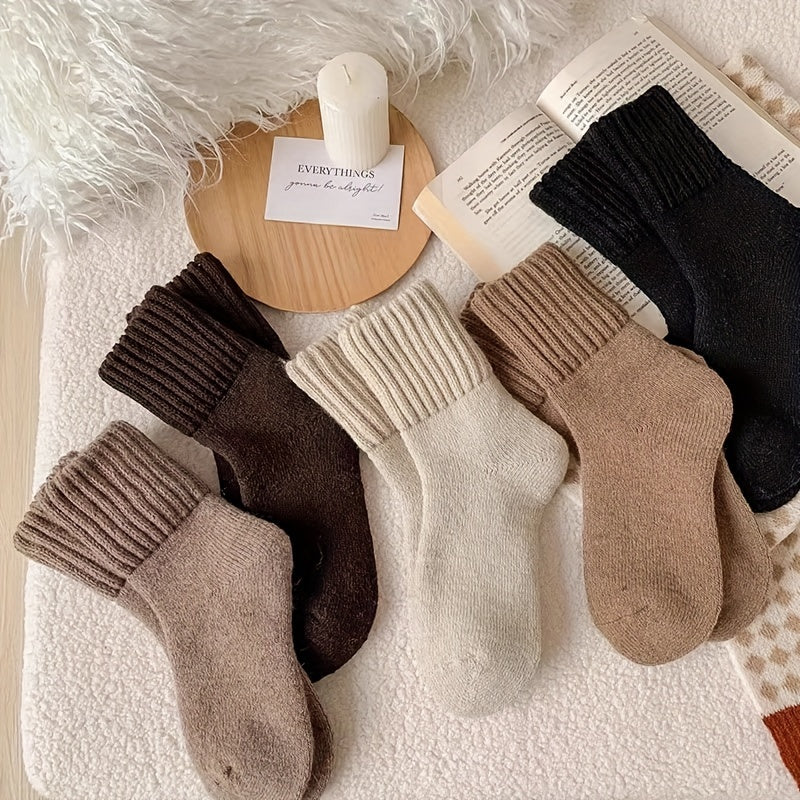 5 pairs of cozy terry socks for women, perfect for all occasions.