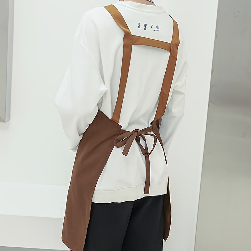 Unisex canvas apron with pockets, adjustable strap, ideal for coffee shops, restaurants, kitchens, and various other professions. Made of durable 240G/M² woven fabric with a protective