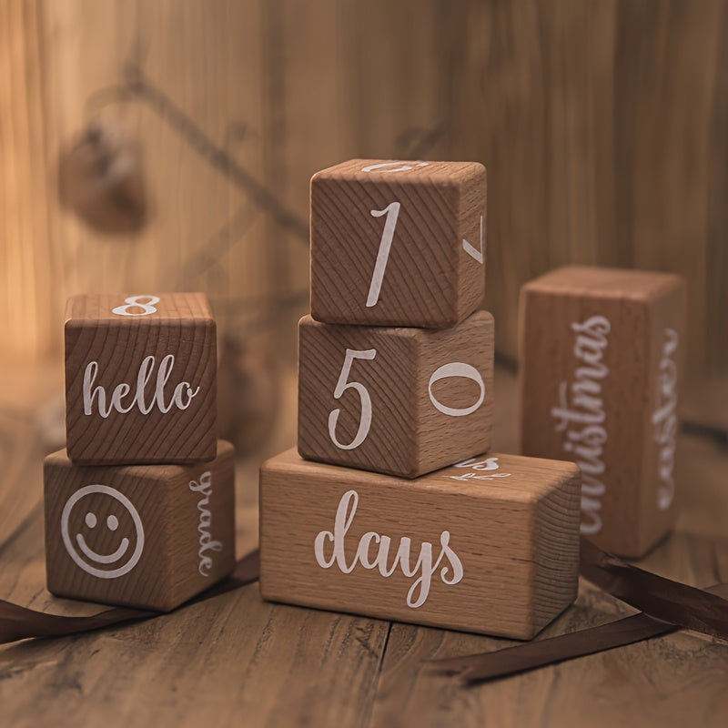 Decorative milestone cubes with printed designs, perfect for capturing growth milestones in photos, ideal for decorating a child's room or commemorating special moments of growth.