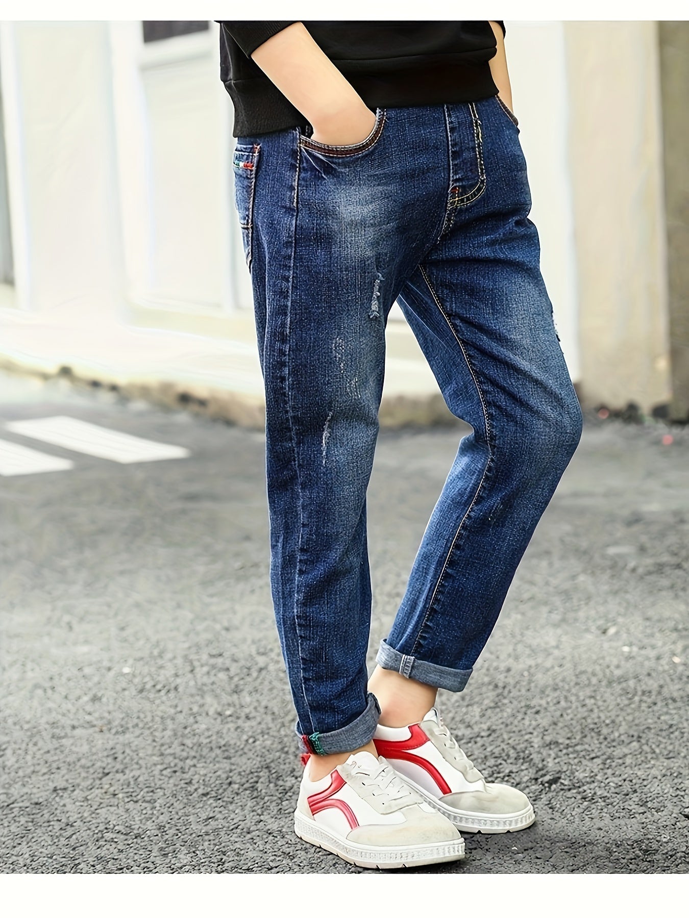 Boys' denim long pants for older kids, suitable for spring, summer, and autumn, in a casual style.