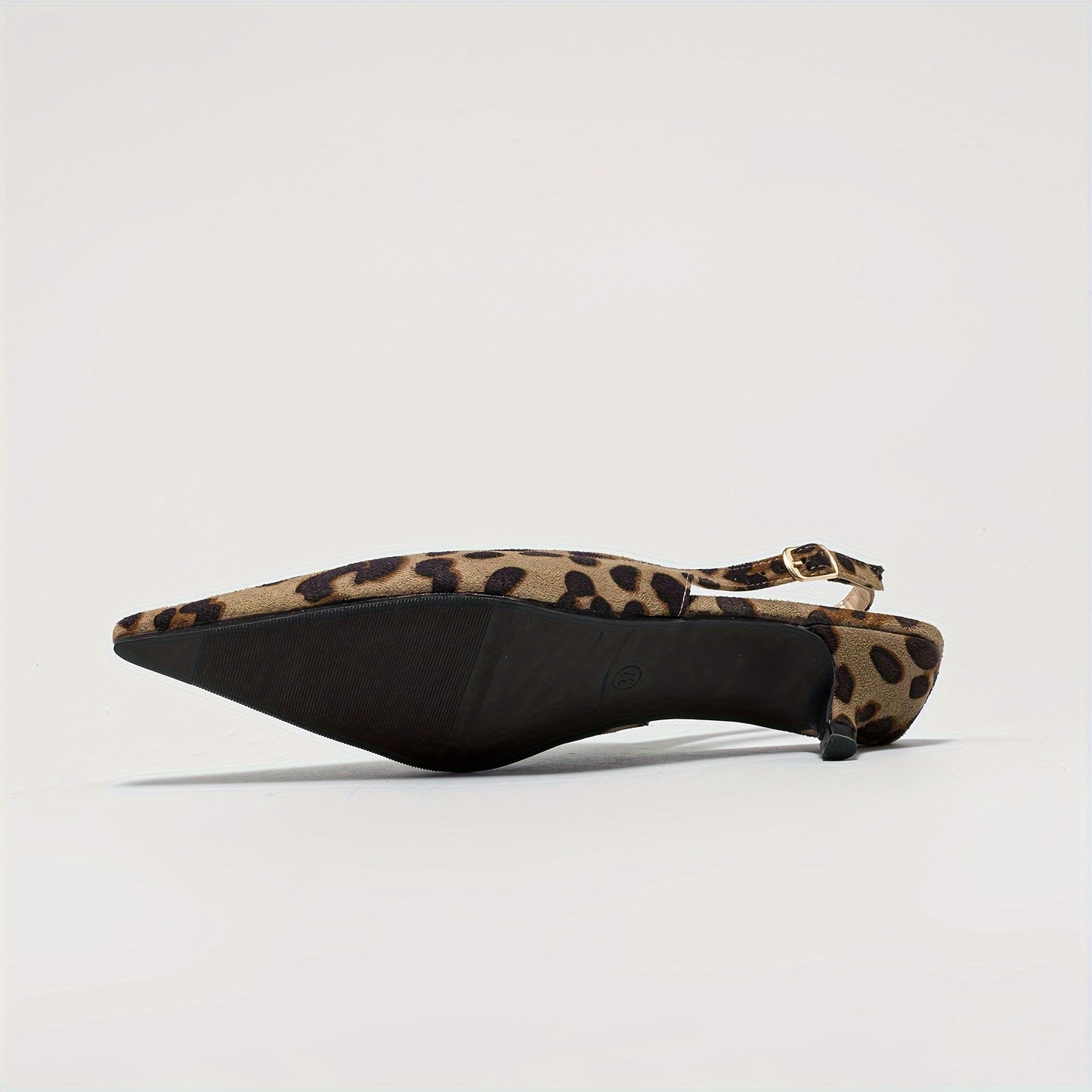 Leopard print pointed-toe mules with low chunky heel, perfect for casual or dressy outfits in summer.