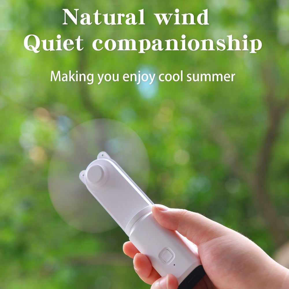 Mini USB fan with touch-proof safety, handheld design perfect for outdoor camping, picnics, and office travel. Features a rechargeable 1.0mAh battery for indoor/outdoor use.