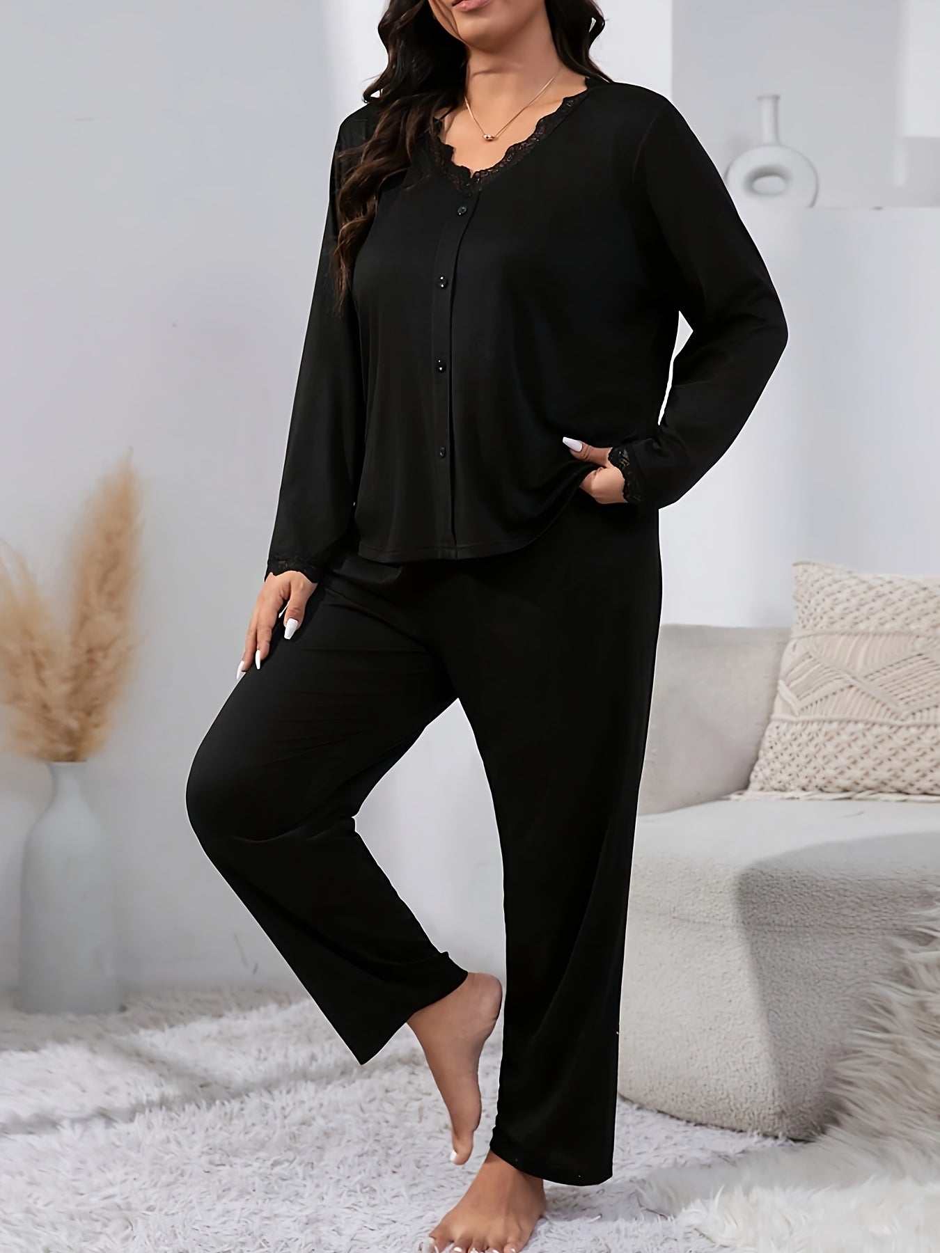 Elegant plus size pajama set with lace detail and buttoned long sleeve top and pants for fall and winter.