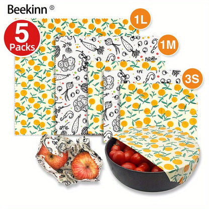 A 5-piece collection of eco-friendly Beeswax Food Wraps - Perfect for wrapping cheese, fruit, bread, snacks and more. These reusable wraps are non-stick and ideal for storing food in your kitchen pantry or refrigerator.