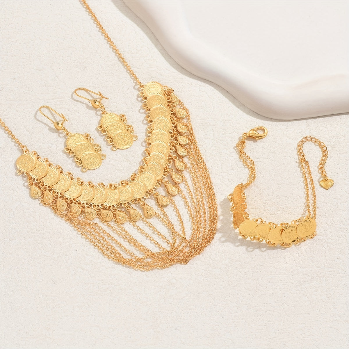 Stylish Four-Piece Set of Tassel Necklace, Coin Earrings, and Bracelet in 18K Gold Plating, Perfect for Everyday Wear