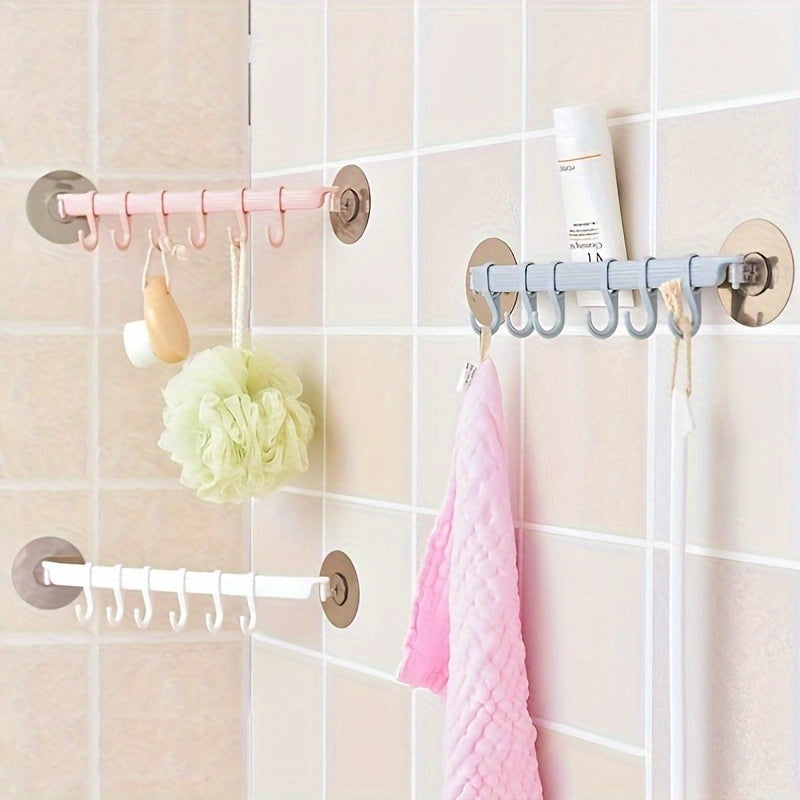 1 piece of strong adhesive hook with 6 hooks for hanging on kitchen walls, corners, or bathrooms without leaving any marks. Useful for hanging clothes and other items.