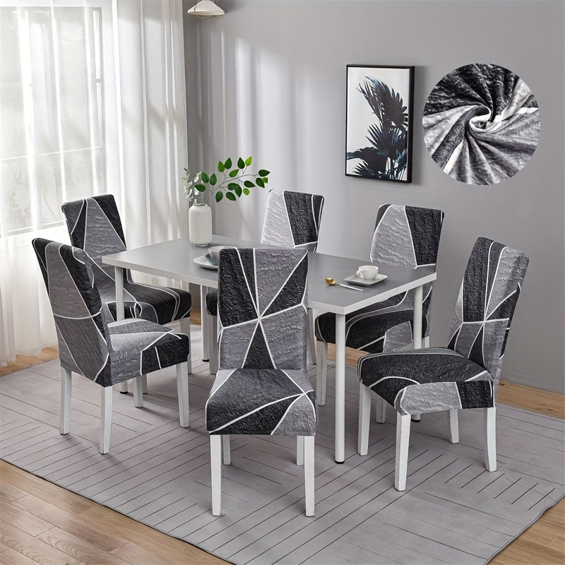 Contemporary geometric chair slipcovers in black and white. Stretchable, dustproof, lightweight fabric. Ideal for home, hotel, or restaurant decor. Easy care, machine washable. Set of 4 or 6.