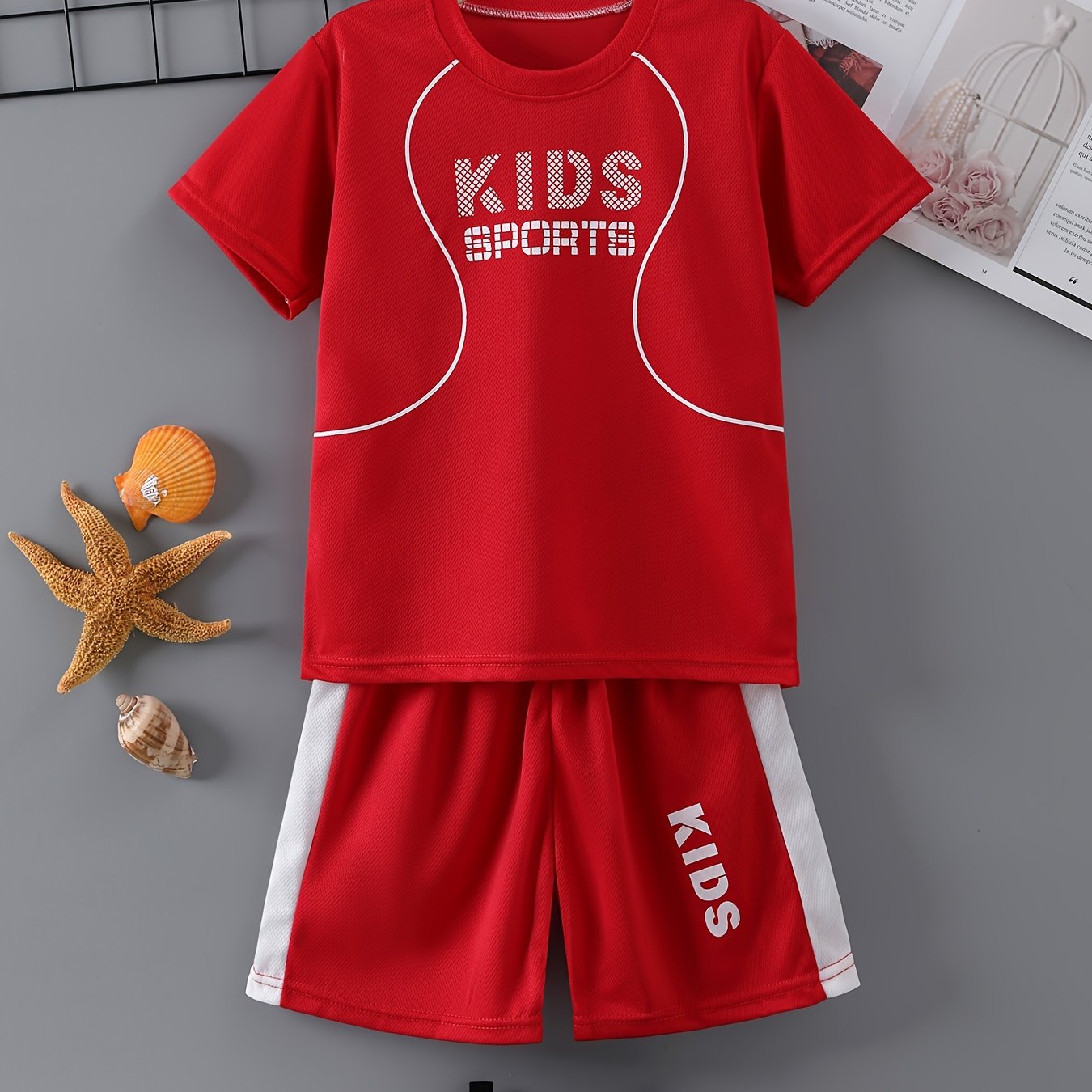 Children's quick-drying sports suit with short-sleeved shorts and KIDS SPORTS printed t-shirt, made with lightweight and comfortable quick-drying fabric.