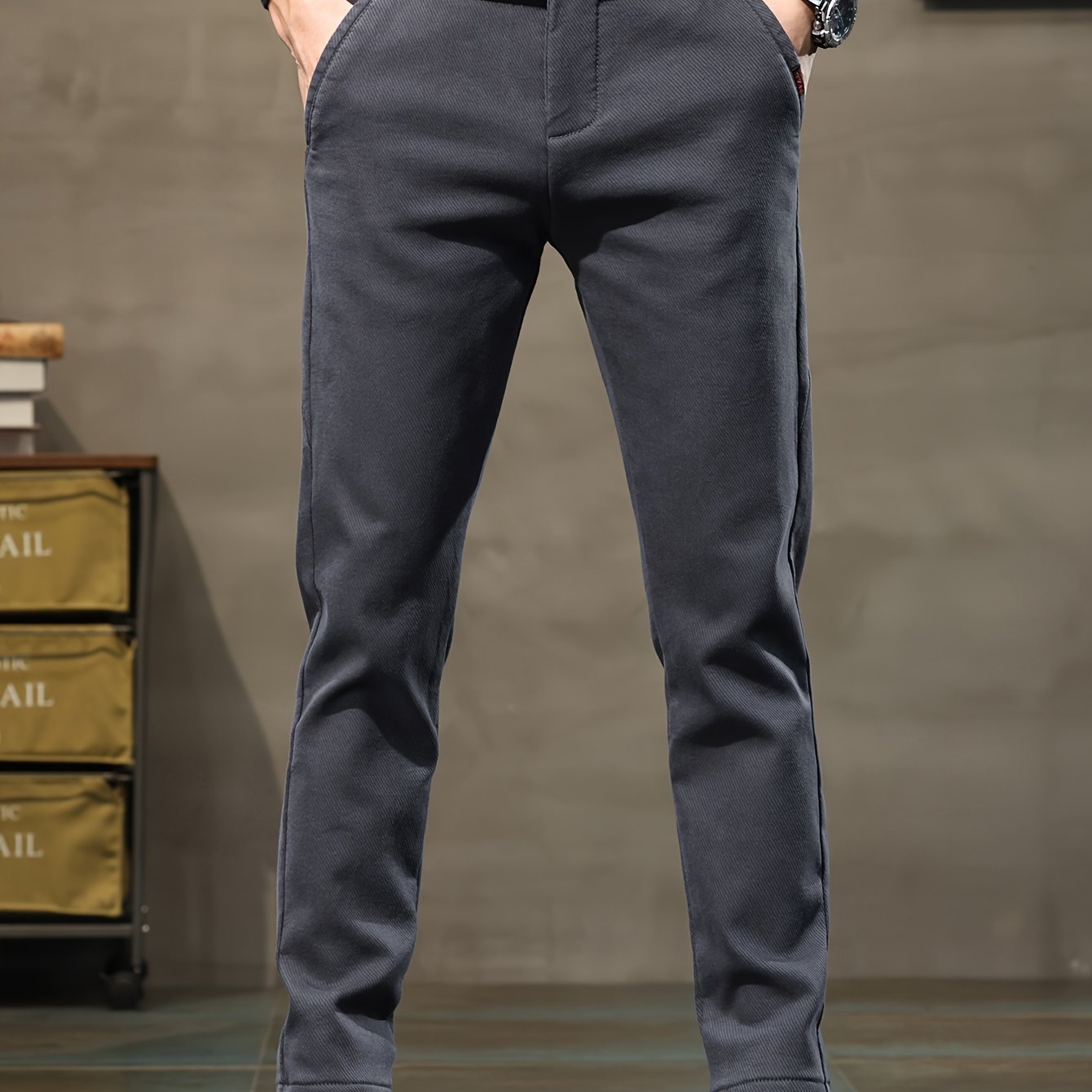 New men's casual pants by a sports brand, perfect for spring and autumn 2023.