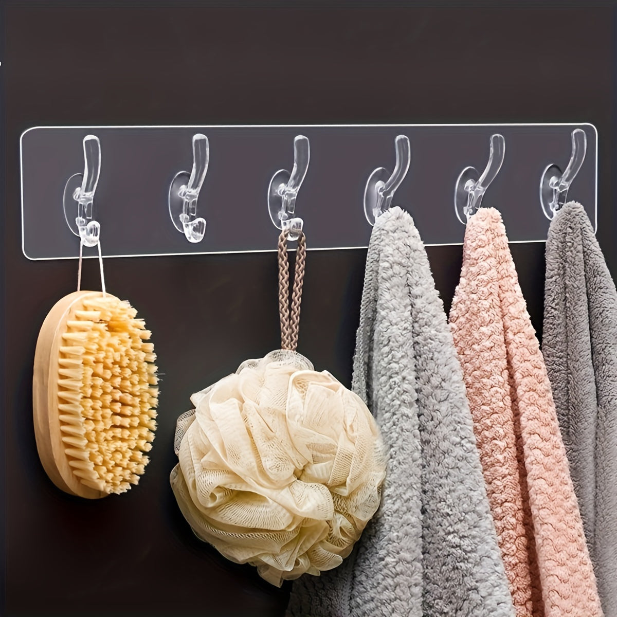 Contemporary transparent waterproof adhesive hooks that require no drilling for easy wall mounting. Ideal for storing clothes, hats, towels, and accessories in the bathroom, wardrobe, or bedroom.