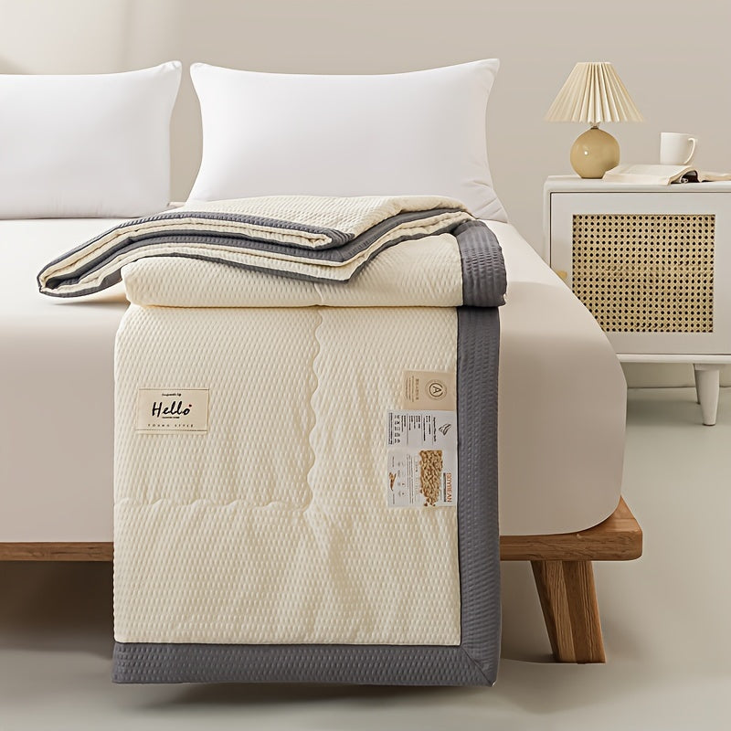 Ultra-soft lightweight summer quilt with cooling bean paste design for bedroom and guest room comfort, machine washable.