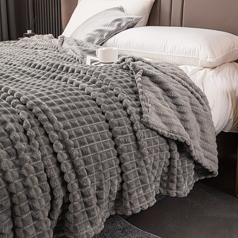 Soft and comfortable waffle plush blanket, made of milk velvet, perfect for use in the bedroom, sofa, office, car, camping, and travel. This multifunctional blanket comes in white, gray, green, brown, and silvery gray solid colors and checkered pattern.