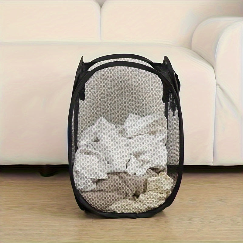 This foldable mesh laundry basket is made with durable material and features handles for easy transport. It is lightweight and has a modern fabric design, making it perfect for storing dirty clothes in the bathroom, bedroom, or laundry room.