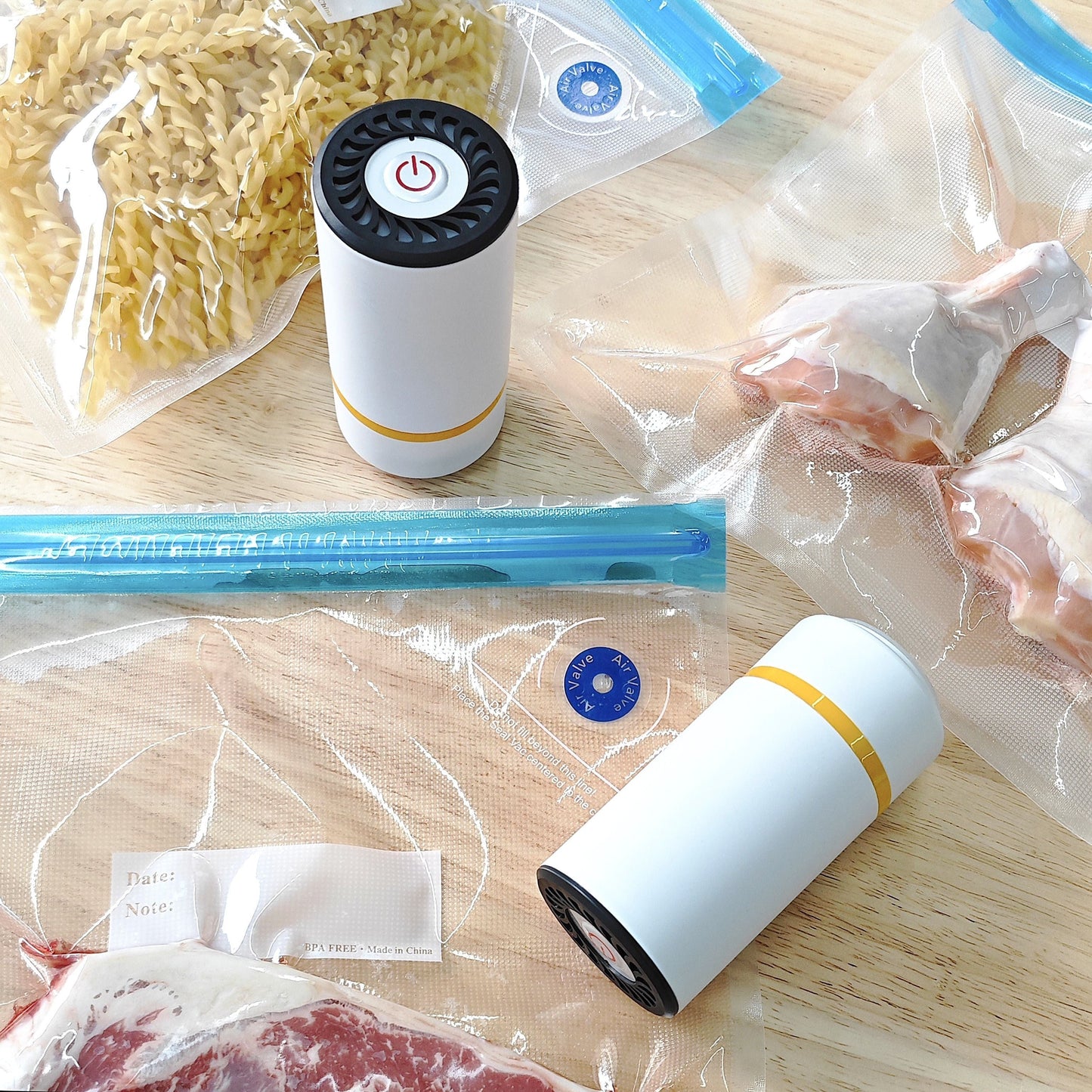 Get the Portable Vacuum Sealer Electric Pump with 5 Reusable Bags - Perfect for Food Storage, Meal Prep, and Sous Vide. This compact machine helps you save food and money. Fits pre-cut seal bags with its universal design. Bags and sealer sold separately.