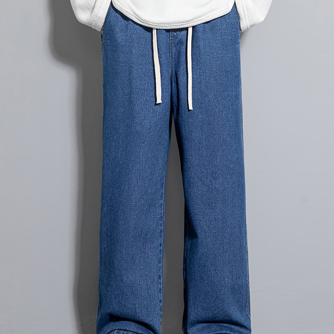 Men's wide leg denim jeans with drawstring waist, loose fit for hip-hop style.