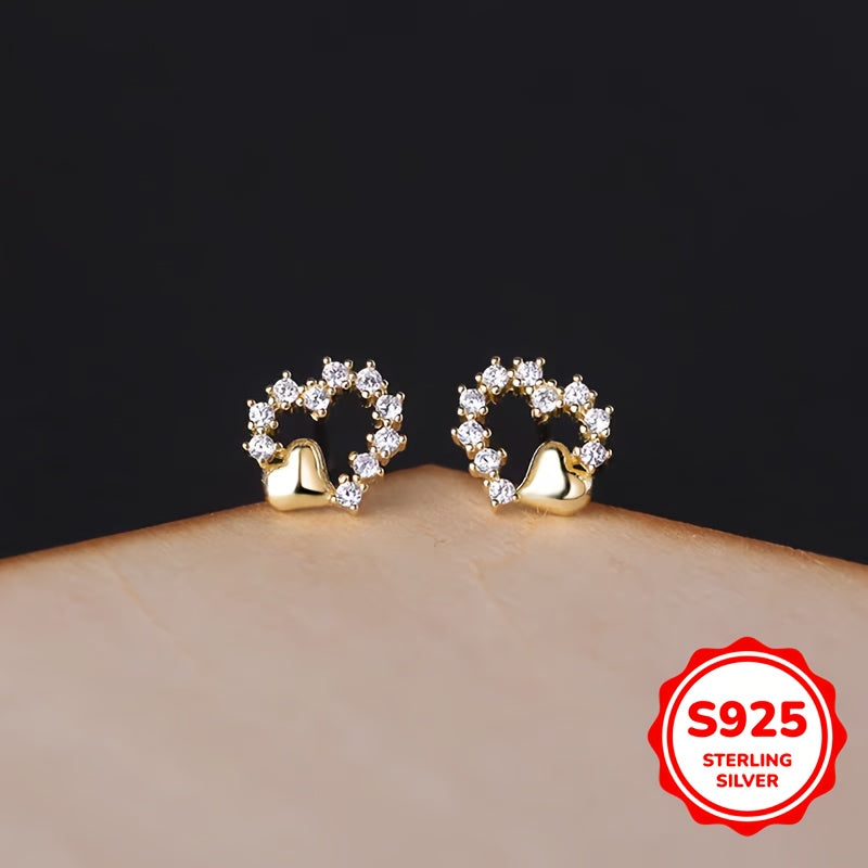 These graceful heart-shaped earrings are crafted from S925 silver with synthetic zirconia stones. Their simple and minimalist design is perfect for girls who prefer a cool and elegant style. These versatile earrings make a great gift for birthdays or