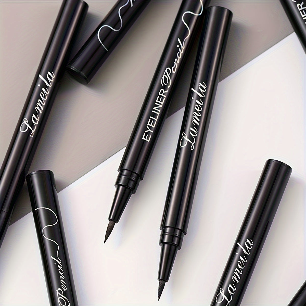 3-Pack of slim, waterproof black liquid eyeliner pens with plant-based squalane.