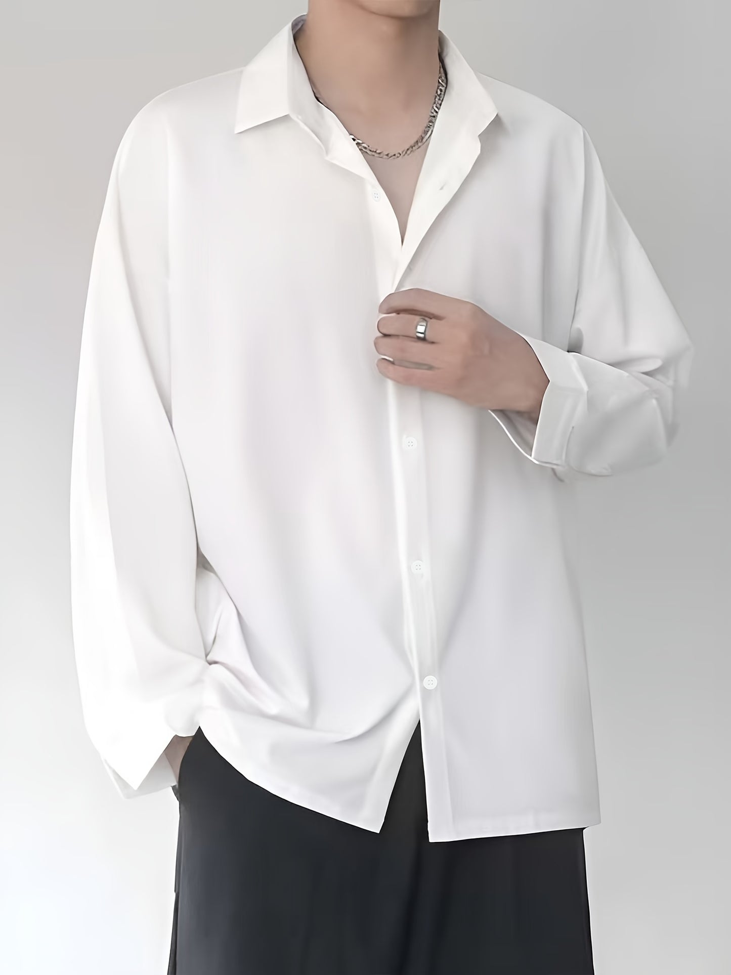 Men's professional solid color long sleeve shirt suitable for business formal and casual wear. Made of polyester, non-stretch, semi-sheer with lapel collar. Ideal for spring/fall workwear.