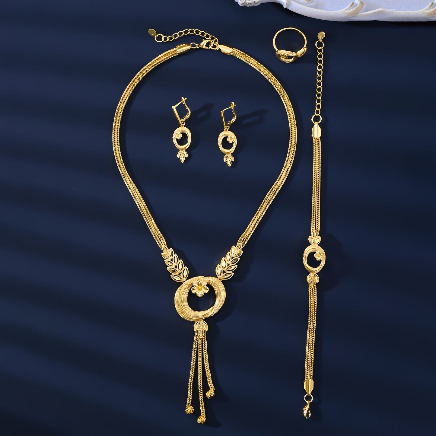 Vintage & Sexy Style 18K Golden Plated Copper Jewelry Set for Women, including Wedding Bridal Necklace, Bracelet, Ring, and Earrings. This all-season set is perfect for daily wear and gift giving.