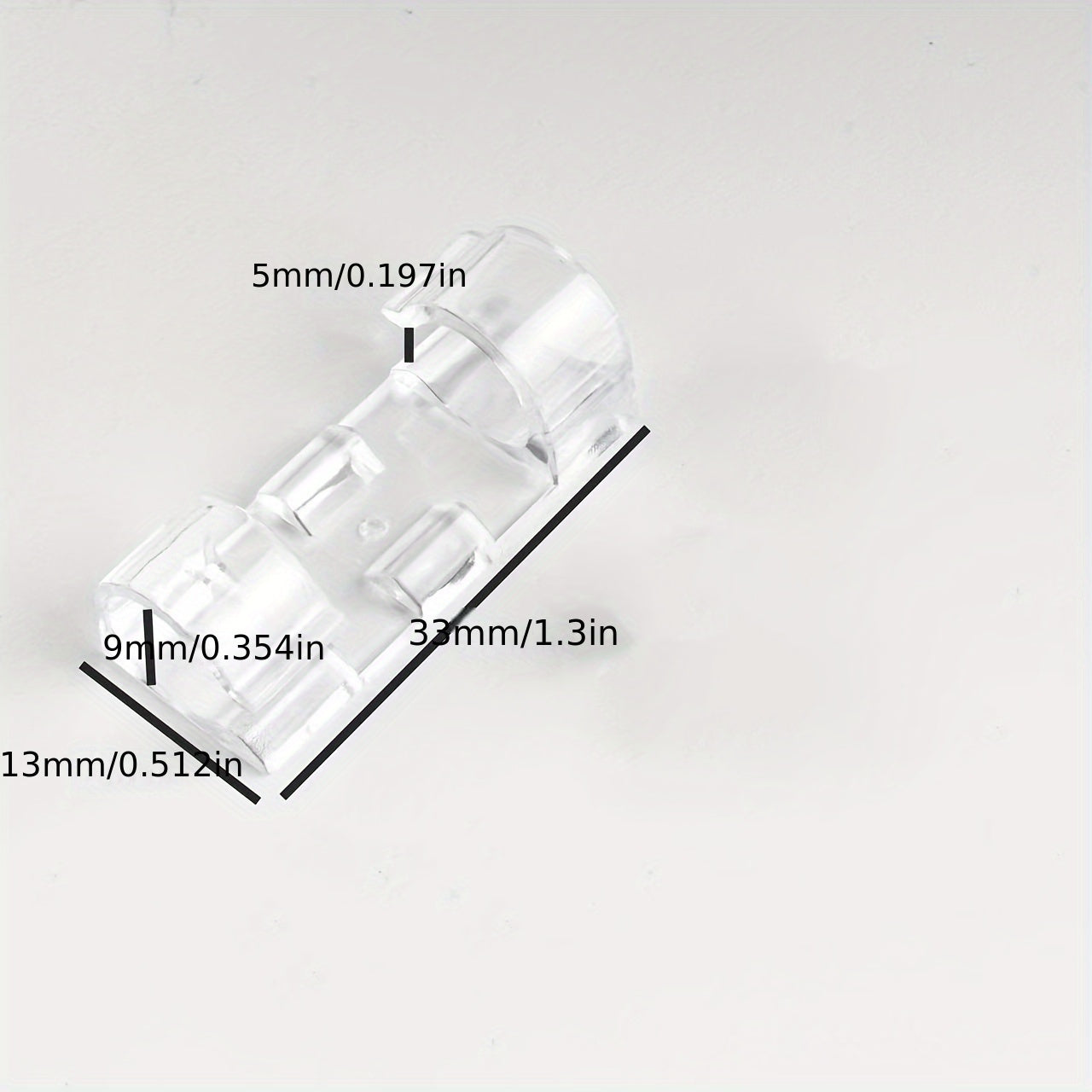 Clear plastic cable clamps for organizing wires in various spaces with a simple and secure design.