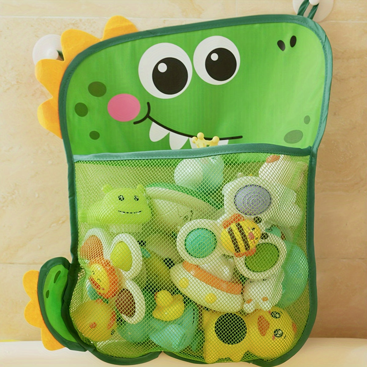 Transform bath time into a delightful experience with this adorable cartoon dinosaur mesh net toy storage bag - an ideal solution for organizing kids' water toys!