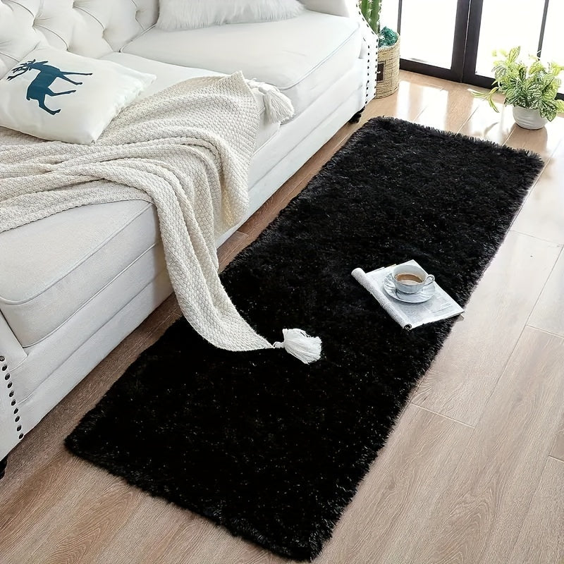 Transform your living space with the luxurious and ultra-soft PV velvet shag area rug. This plush and stain-resistant carpet is perfect for adding warmth and style to your living room, bedroom, or dorm decor. With its non-slip design, it is perfect for