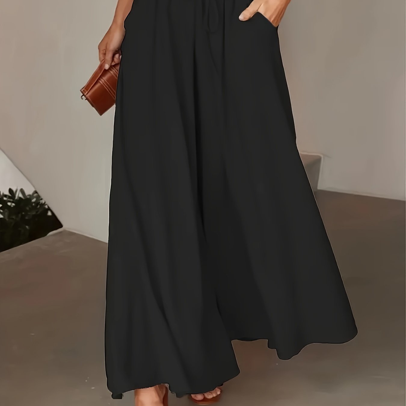 Spring/summer wide-leg pants with elastic waist and tie, for casual wear by women.