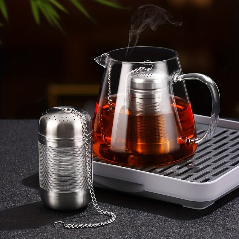 One piece of a large tea infuser made of 304 stainless steel with a mesh tea ball design. This food-grade tea strainer includes an interval diffuser and an extended chain hook for loose leaf tea and coffee. Perfect for coffee accessories.