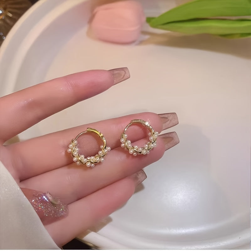 Stylish floral wreath hoop earrings with faux pearls, elegant and versatile, made of golden-toned zinc alloy with stainless steel posts, perfect for daily wear or vacation