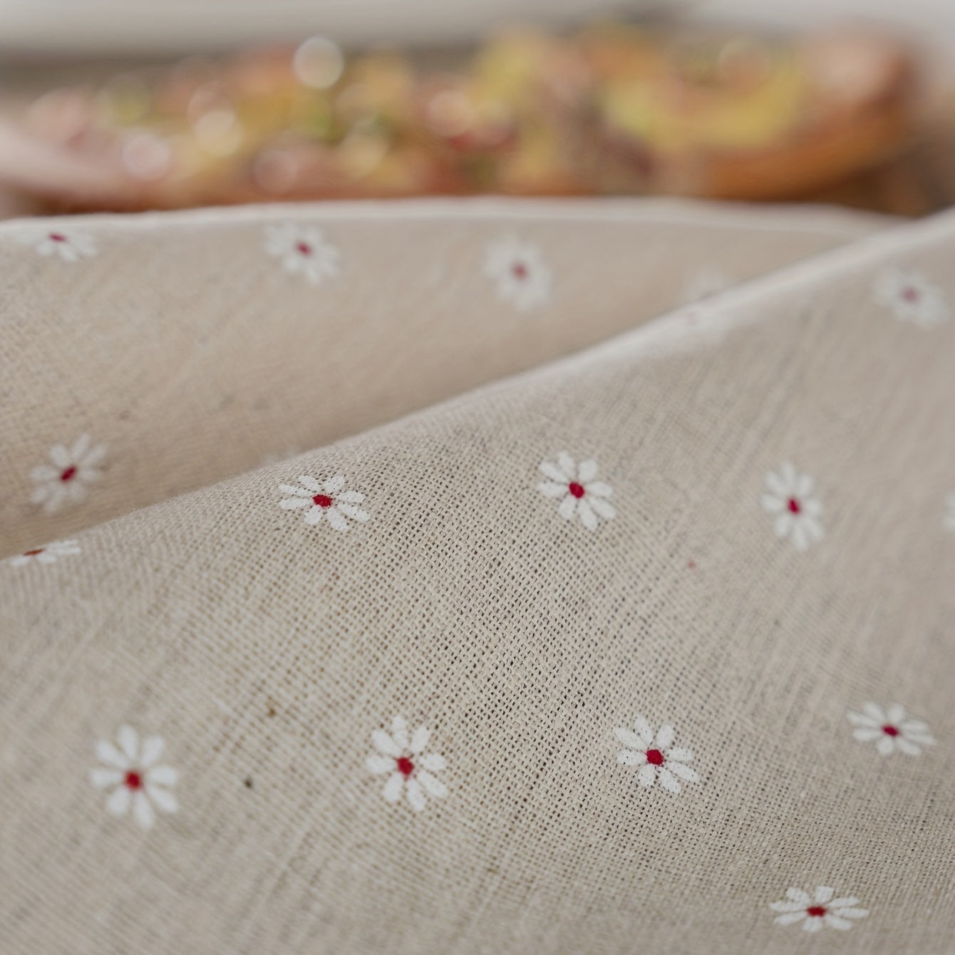 White chrysanthemum and beige linen print farmhouse floral tablecloth with tassels, ideal for kitchen and dining decor. Ready for Thanksgiving, made of polyester, rectangular shape.