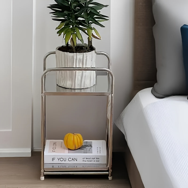 This modern stainless steel utility rack has two tiers and can be used for multiple functions. It does not require any assembly and can be used as a side sofa table or bedside organizer stand. It can be used without the need for electricity.