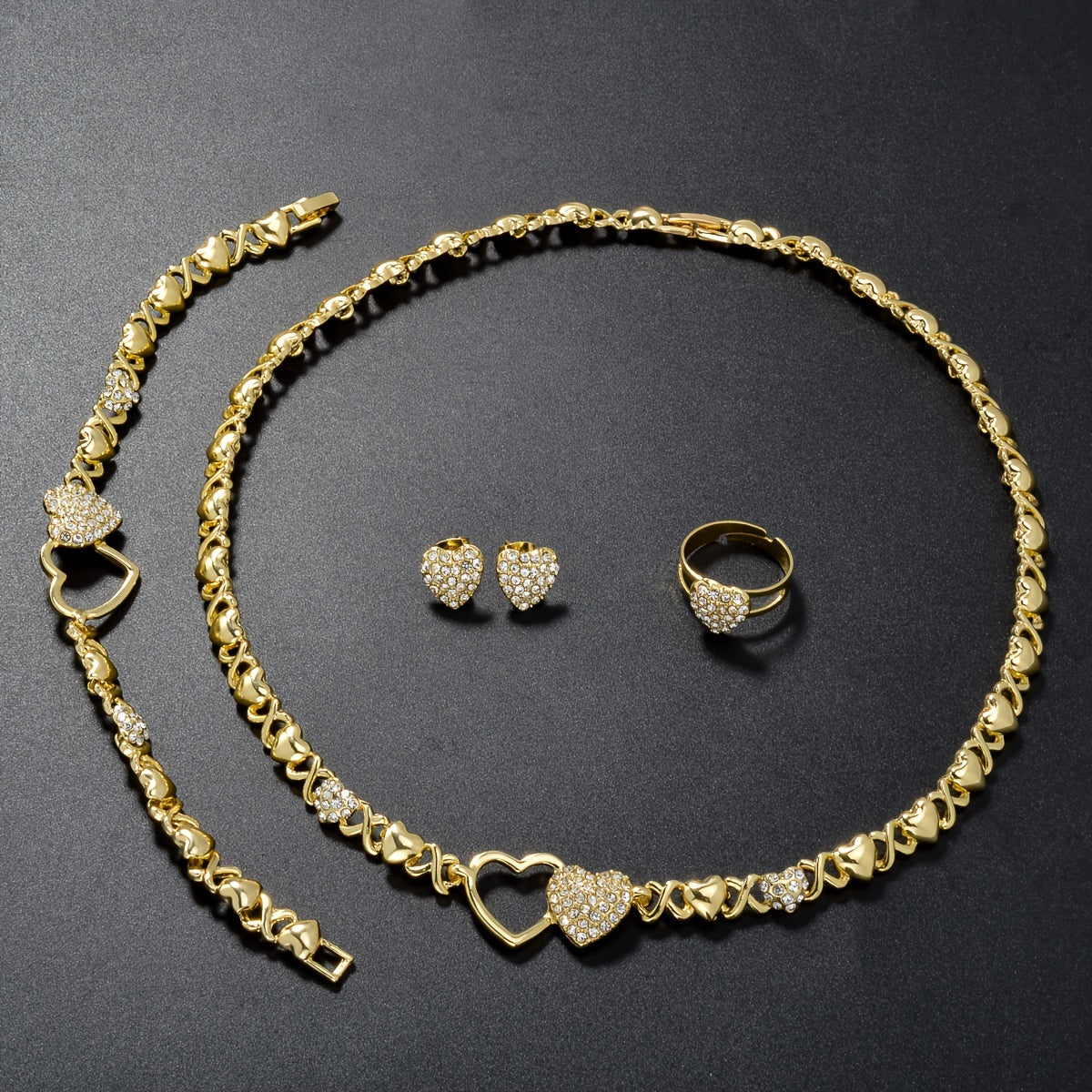 A stylish jewelry set including a dazzling zirconia necklace, bracelet, earrings, and ring, perfect for daily wear or holiday parties. This cute and elegant set makes a great gift for any woman in your life.