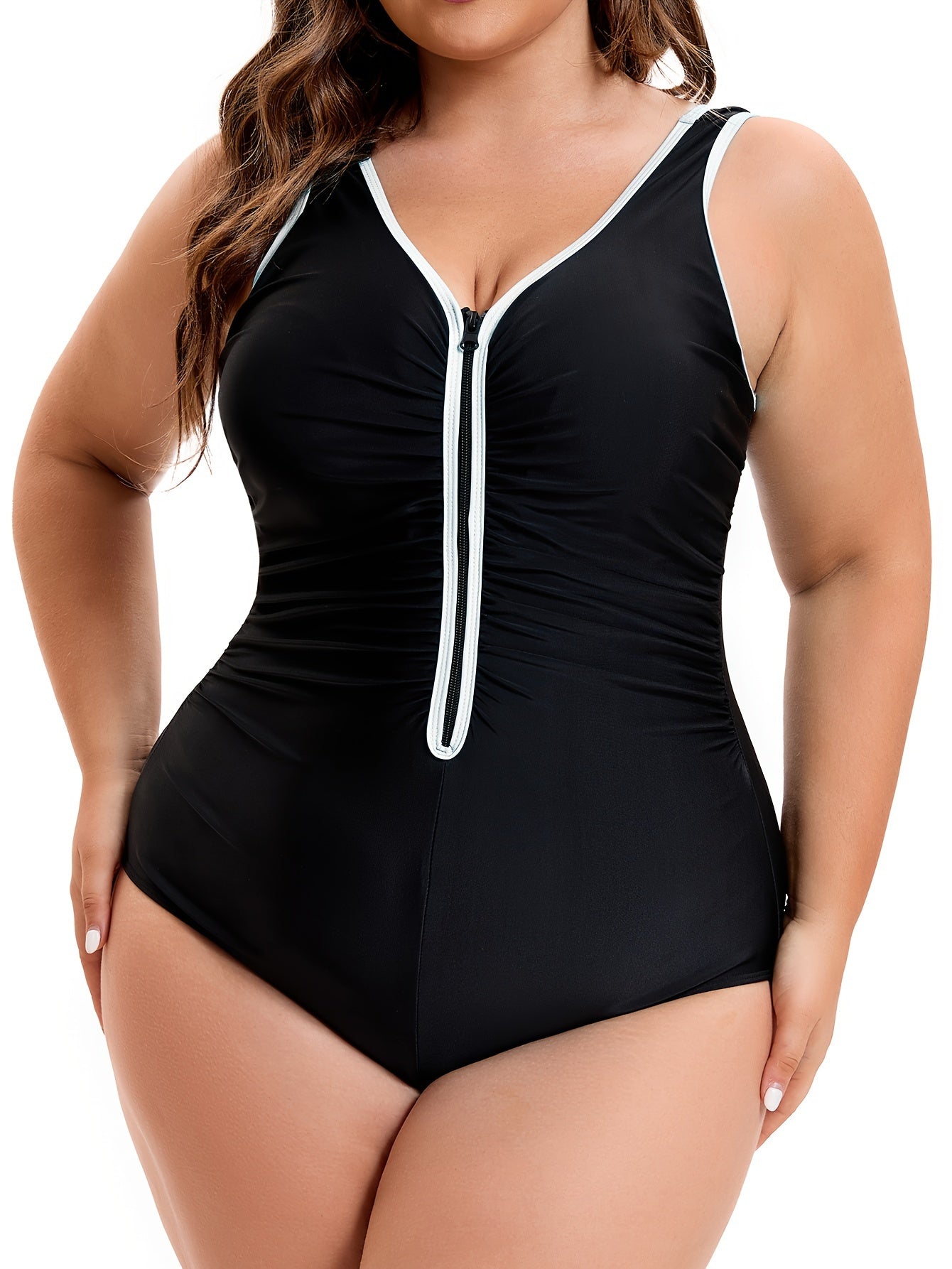 Sporty contrast trim one-piece swimsuit with zipper front, ruched slimming design, for plus size women.