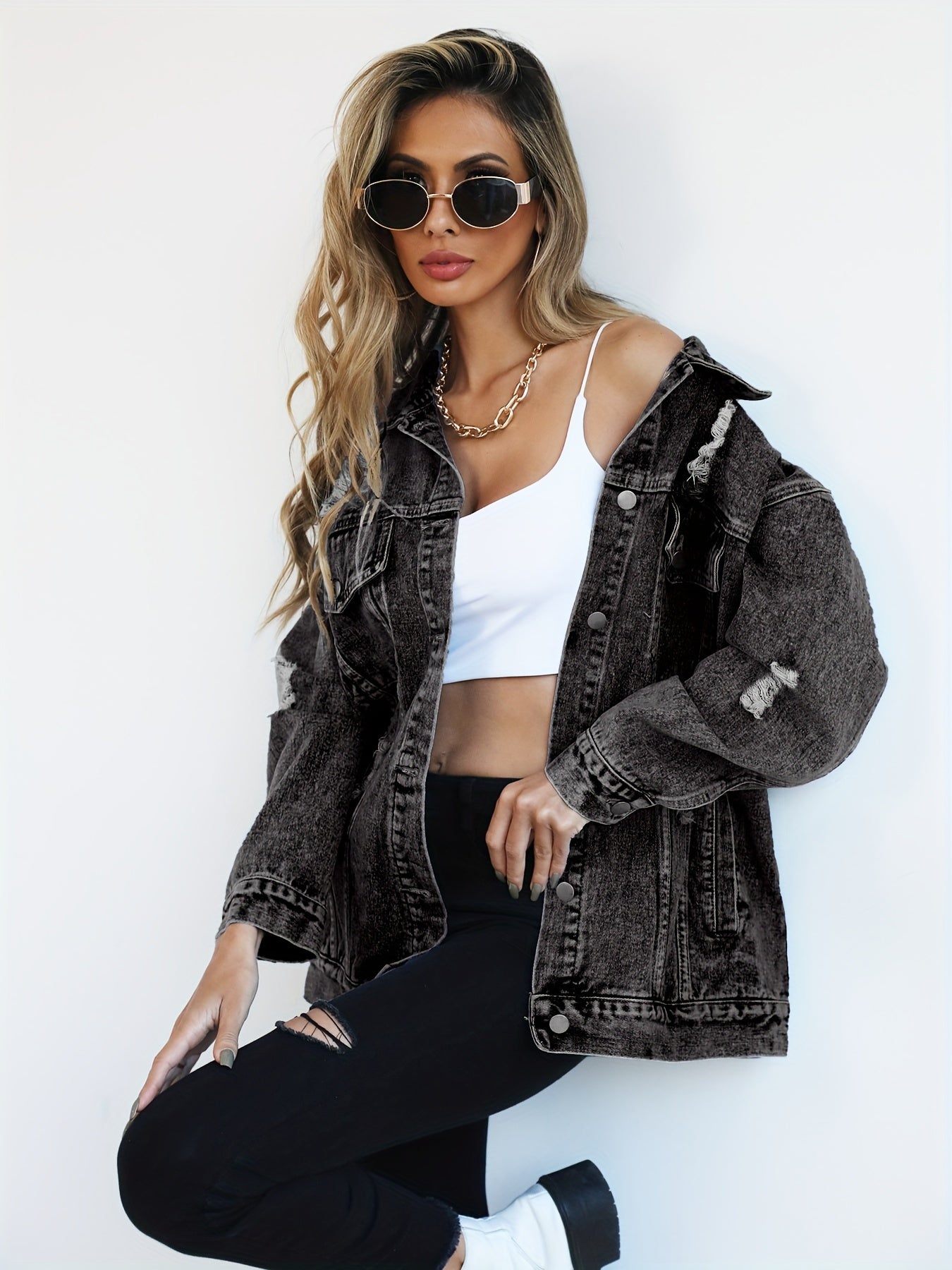 Women's ripped denim jacket