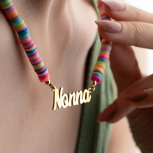 Customized Rainbow Name Necklace plated in 18K gold, featuring polymer clay beads. This accessory is both elegant and adorable, perfect for wearing all year round at any occasion. A great gift idea for Christmas and New Year's.