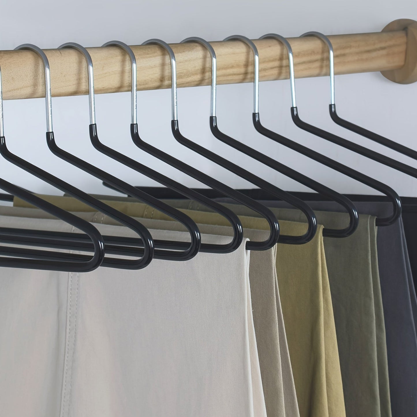 Set of 10 stainless steel hangers with standard design - Save space and prevent slipping with this non-slip pants rack. Organize your closet with these durable hangers designed for trousers, skirts, and dresses. Features a no trace integrated clamping