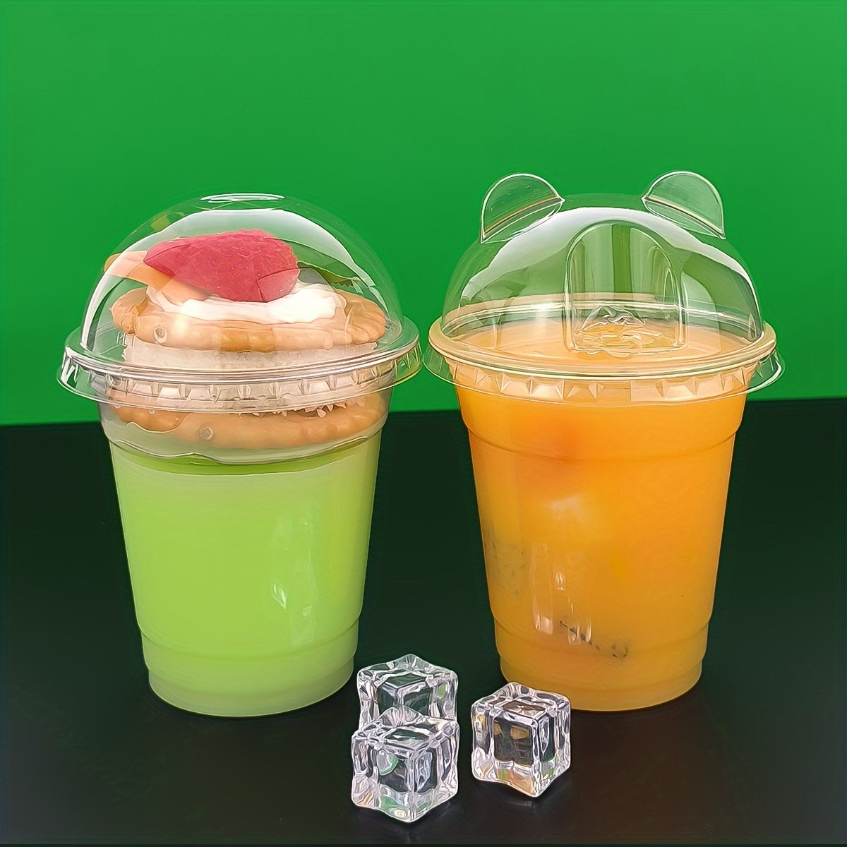 50 pieces of transparent plastic cups with lids, each holding 9oz to 10oz. Perfect for festivals, parties, serving cold drinks, desserts, and coffee. Essential party supplies for any occasion. Add these drinkware accessories to your collection!