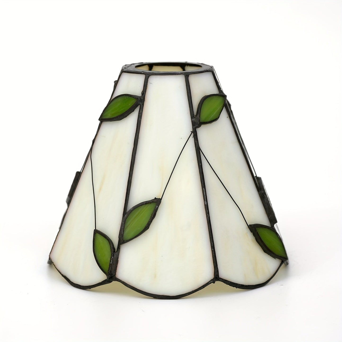 This 6-Inch Leaf Pattern Handcrafted Stained Glass Lamp Shade is an artisan crafted decorative piece perfect for pendant and wall lighting fixtures. Suitable for ages 14 and up, this lampshade does not include any battery or wireless features.