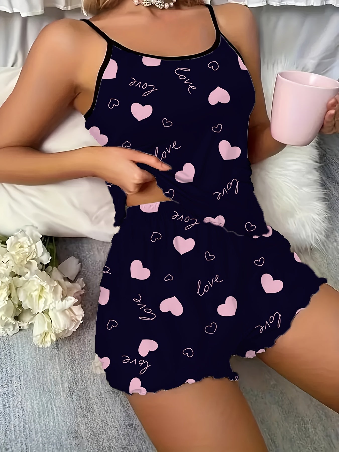 Women's sexy polyester pajama set with love heart print spaghetti strap shorts, perfect for all seasons.