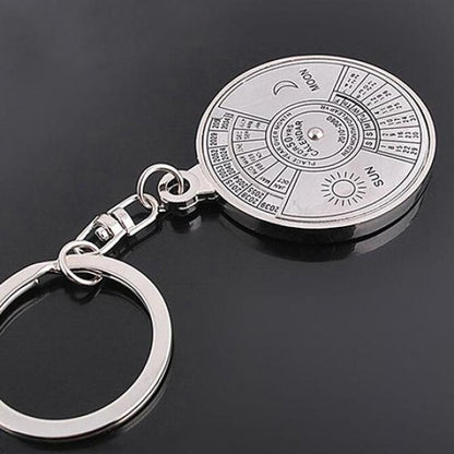 Perpetual calendar keychain with rotating compass. Unique gift for car keys.