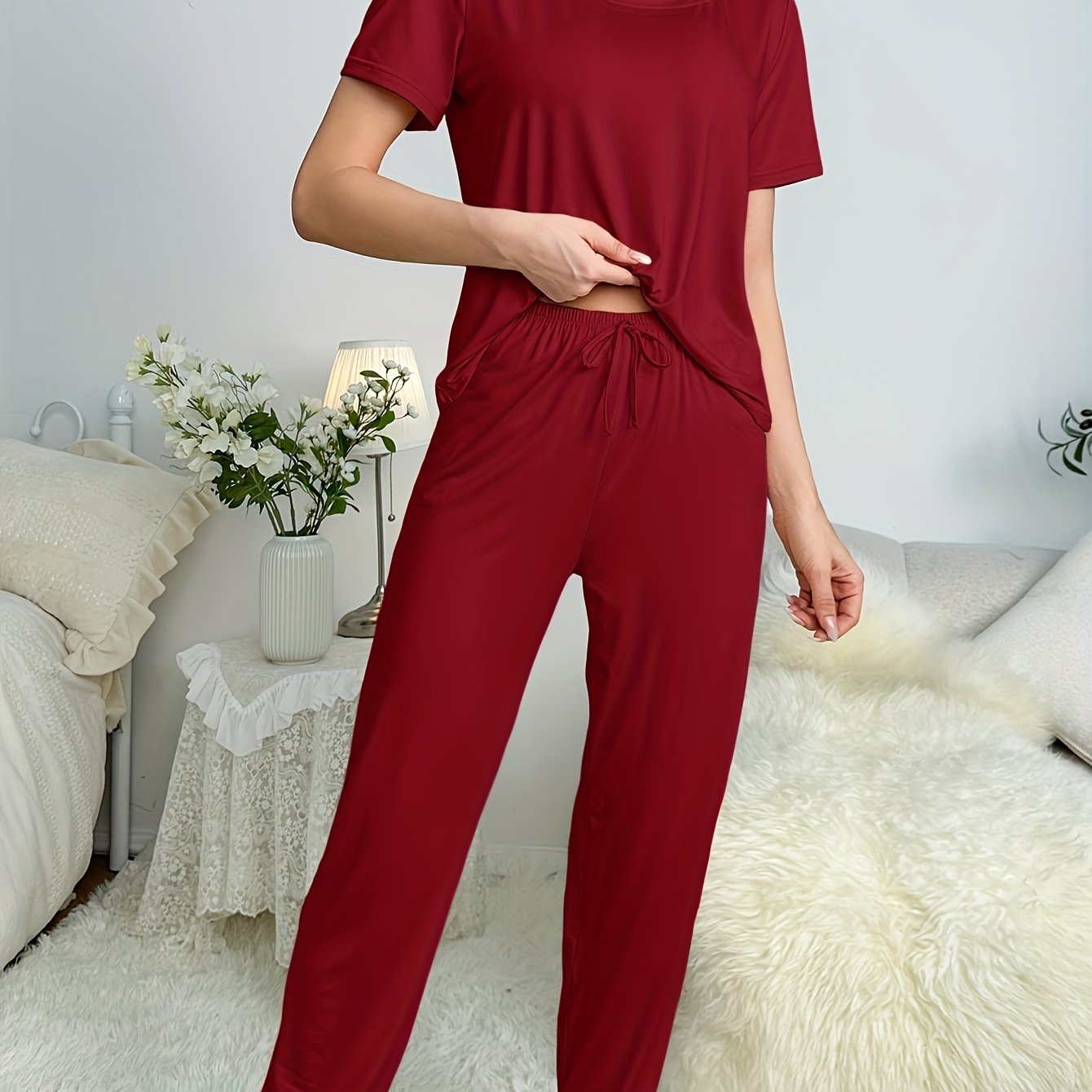 Basic pajama set with short sleeve top and drawstring joggers, perfect for women's sleep and loungewear.