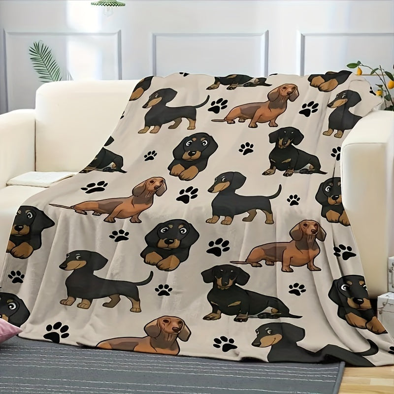 Soft and cozy Dachshund dog print fleece blanket perfect for pet lovers. This all-season throw is machine washable with a digital print design on a polyester cover and lining. Made with 200-250gsm knitted fabric in a contemporary style, this